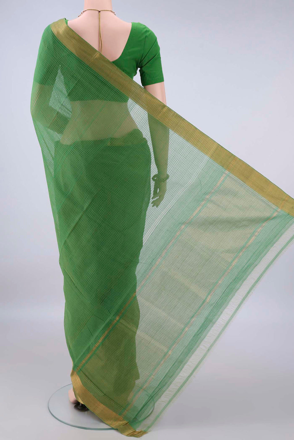 Flat view of Green Mangalagiri Cotton Saree with Stripes on the body and Zari Border. 