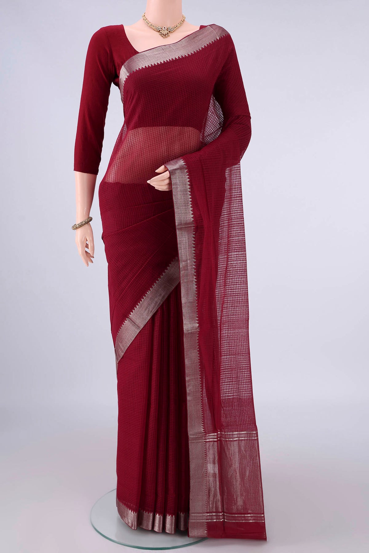 Maroon Mangalagiri Cotton Saree with Stripes on the body and Zari Border.  displayed on a mannequin