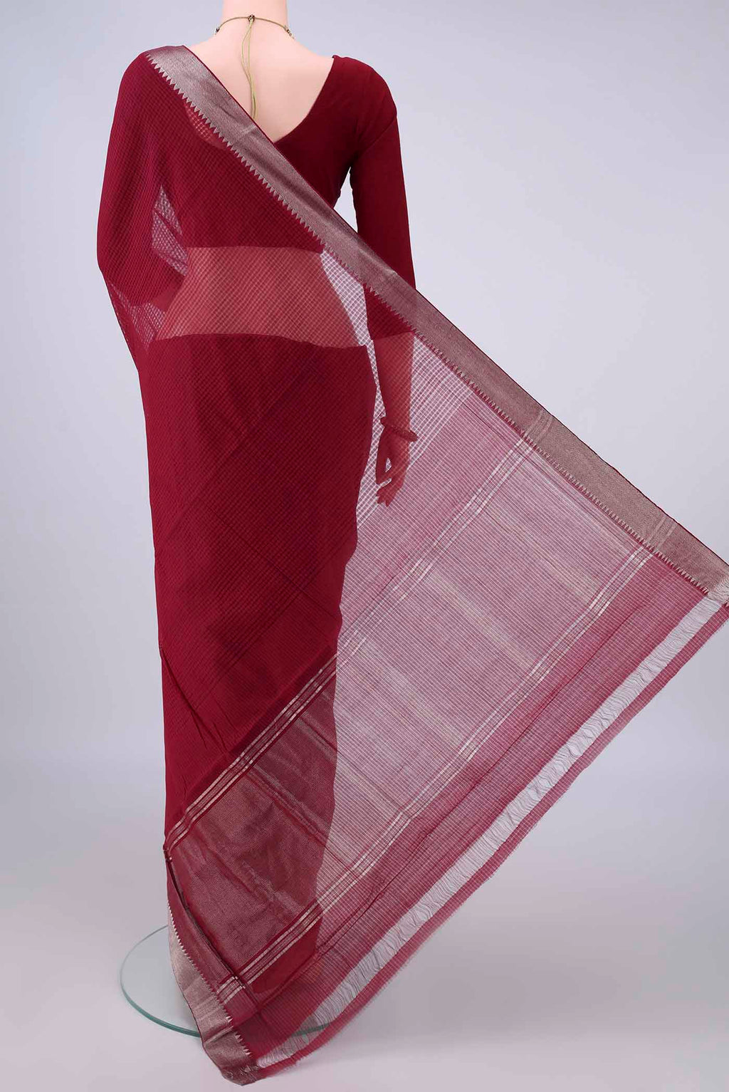 Flat view of Maroon Mangalagiri Cotton Saree with Stripes on the body and Zari Border. 