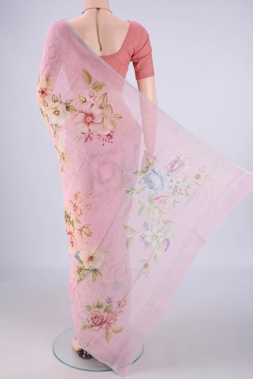 Flat view of Rani Pink Linen Saree with Floral Print on the body and Zari Border. 