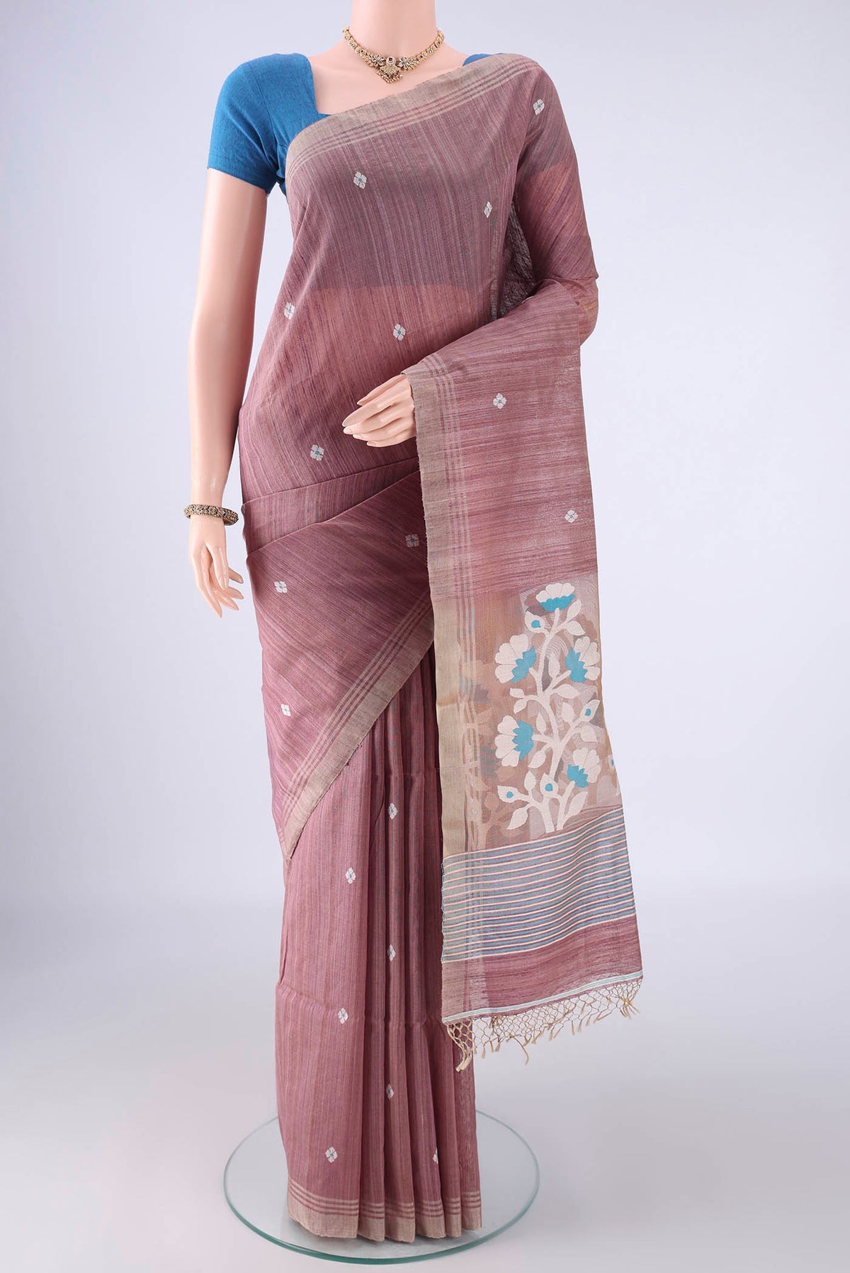 Mauve Jute Silk Saree with Thread Butta on the body and Plain Border.  displayed on a mannequin