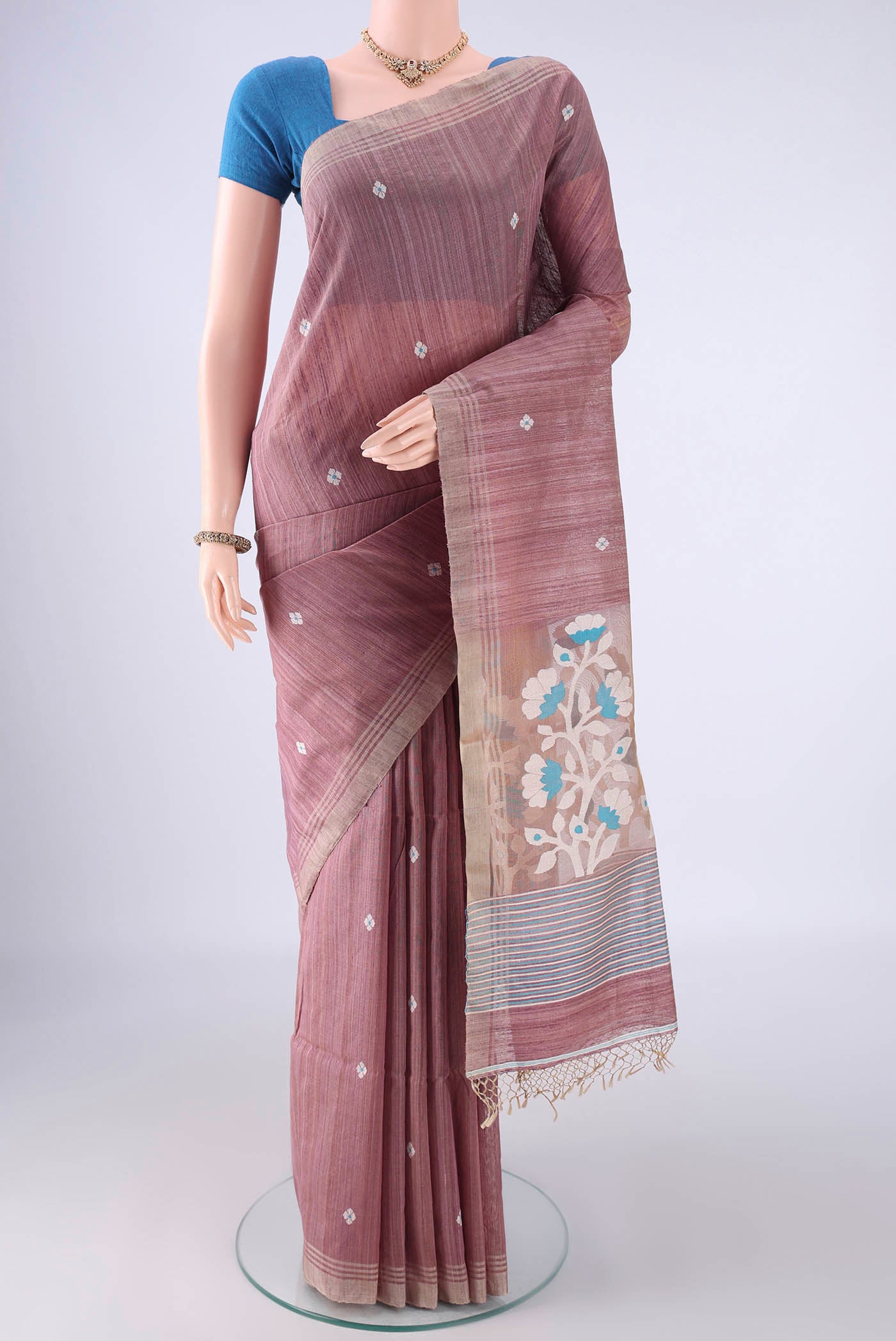 Mauve Jute Silk Saree with Thread Butta on the body and Plain Border.  displayed on a mannequin