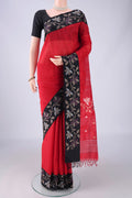 Red Jute Silk Saree with Plain Body and Silk Border.  displayed on a mannequin