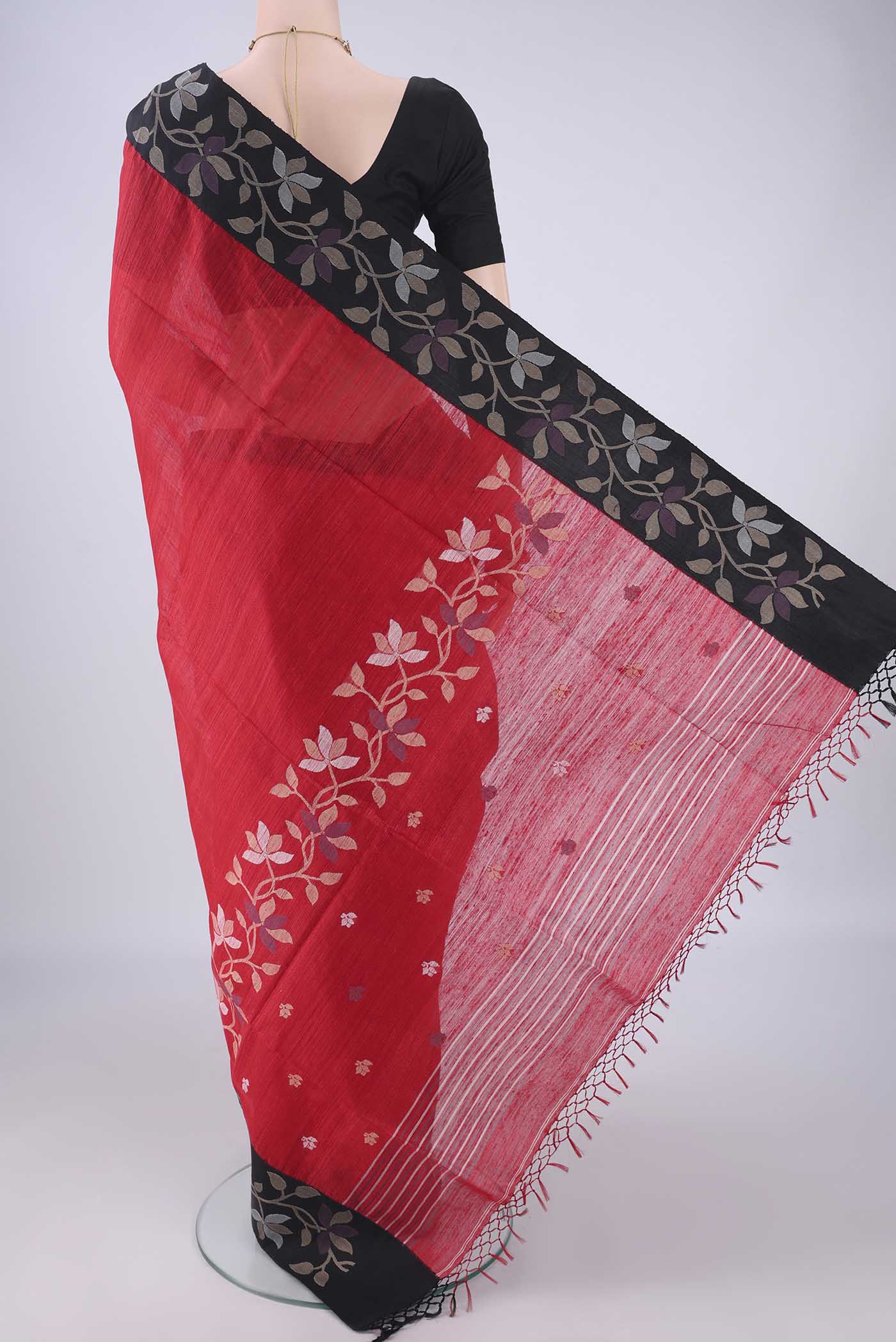 Flat view of Red Jute Silk Saree with Plain Body and Silk Border. 
