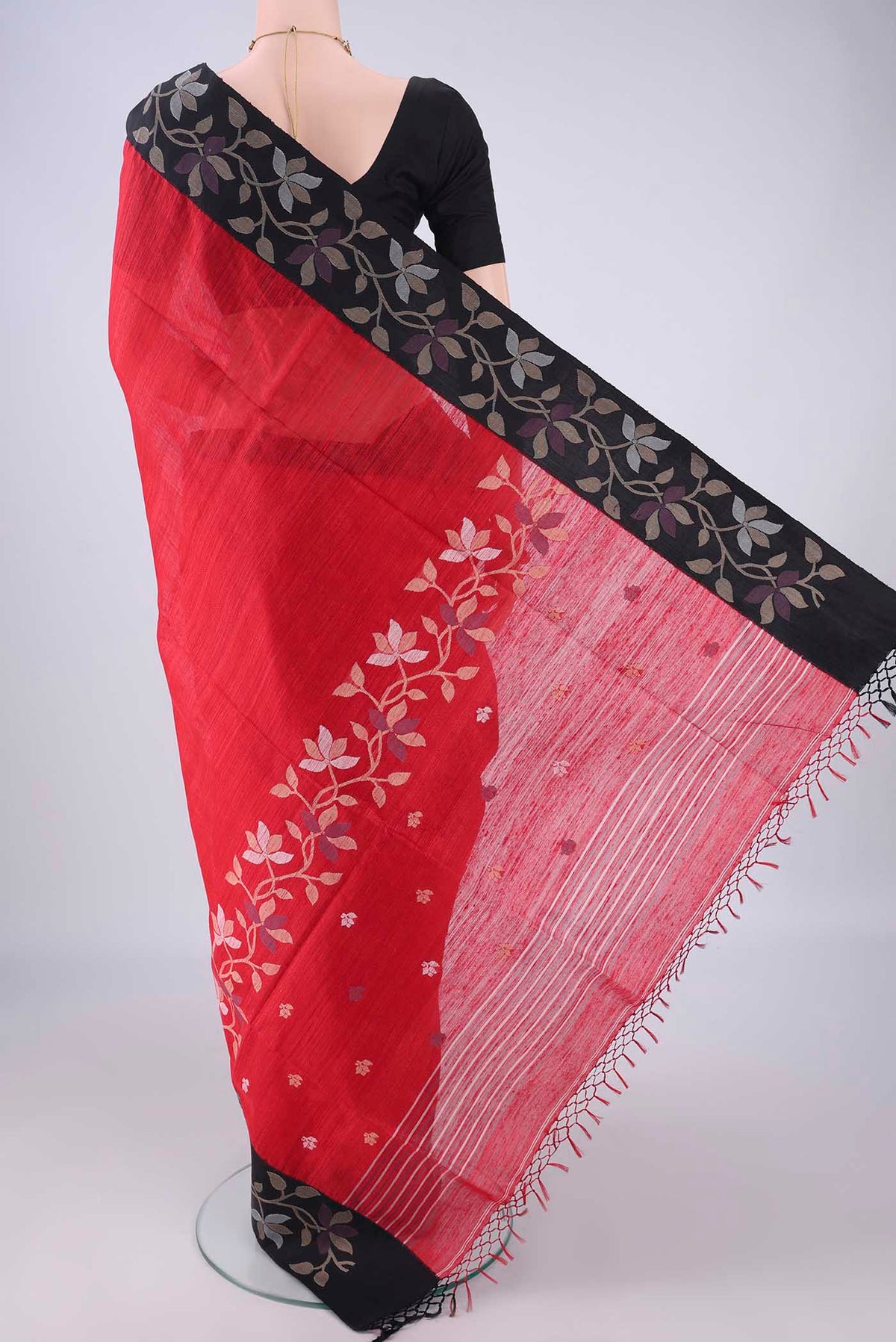 Flat view of Red Jute Silk Saree with Plain Body and Silk Border. 