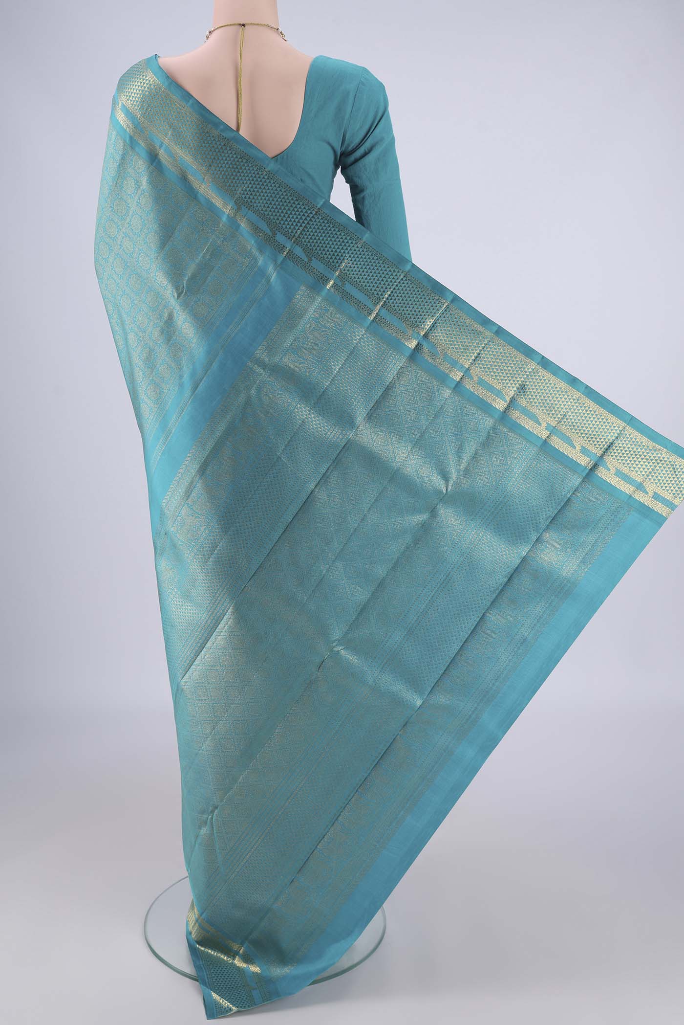 Flat view of Pure Silk Pure Zari Sea Green Kanjivaram Saree with Zari Brocade on the body and Zari Border. 