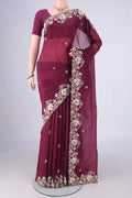 Burgundy Kanjivaram Silk Saree with Embroidery on the body and Embroidery Border.  displayed on a mannequin