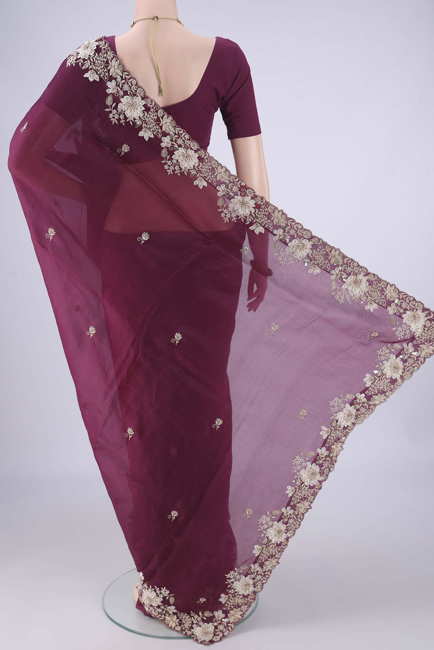 Flat view of Burgundy Kanjivaram Silk Saree with Embroidery on the body and Embroidery Border. 