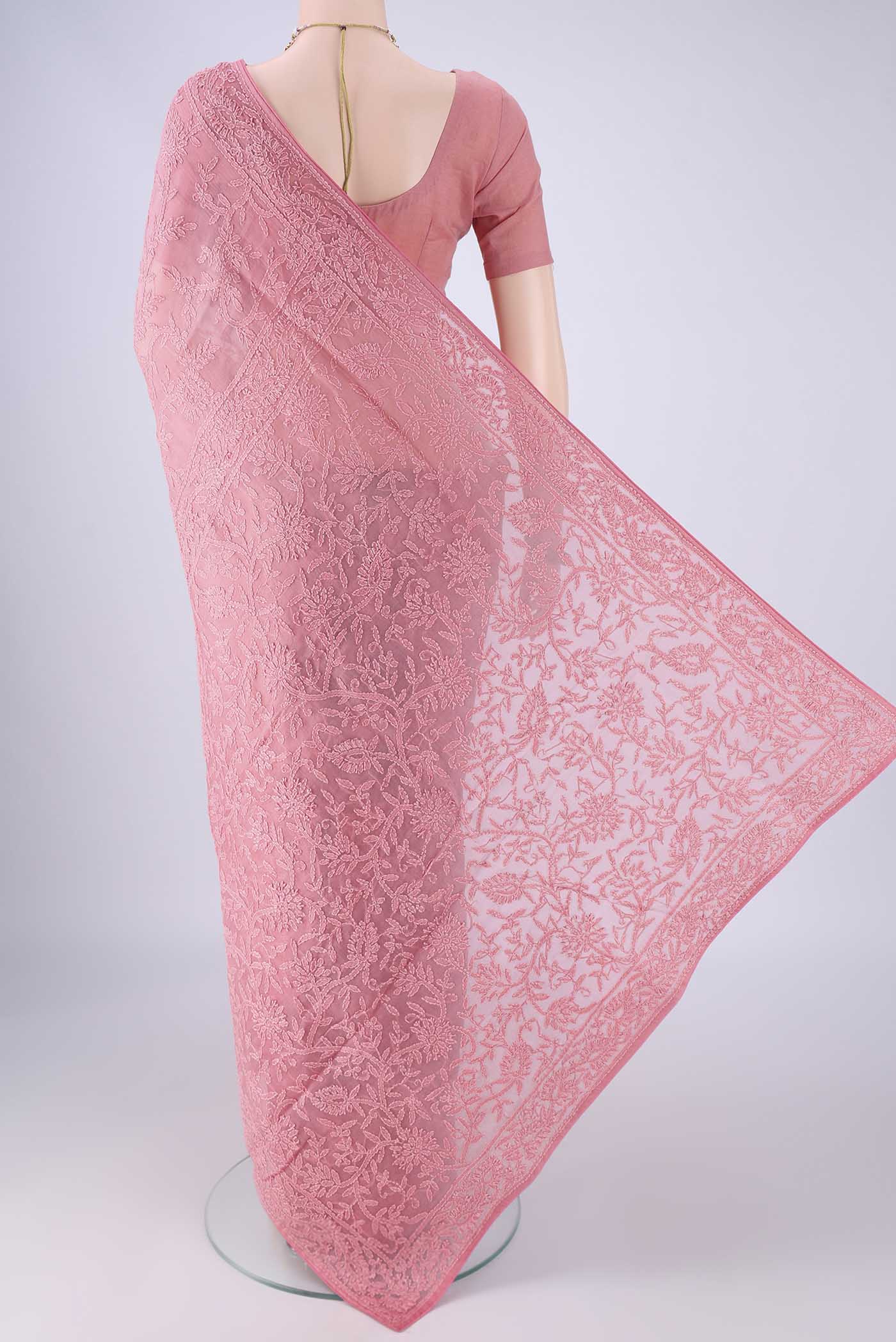 Flat view of Pink Organza Silk Saree with Embroidery on the body and Embroidery Border. 