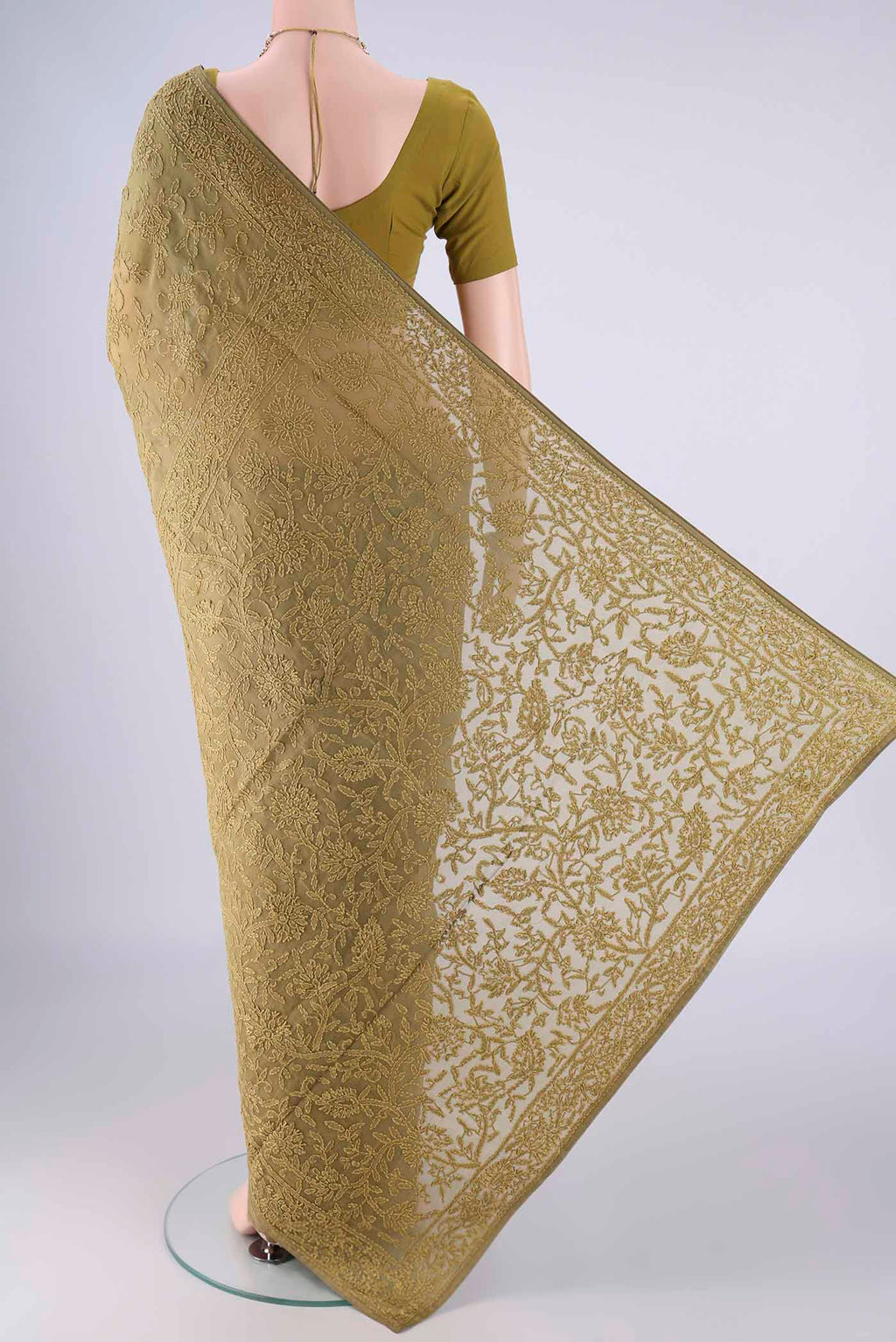 Flat view of Mehandi Green Organza Silk Saree with Embroidery on the body and Embroidery Border. 