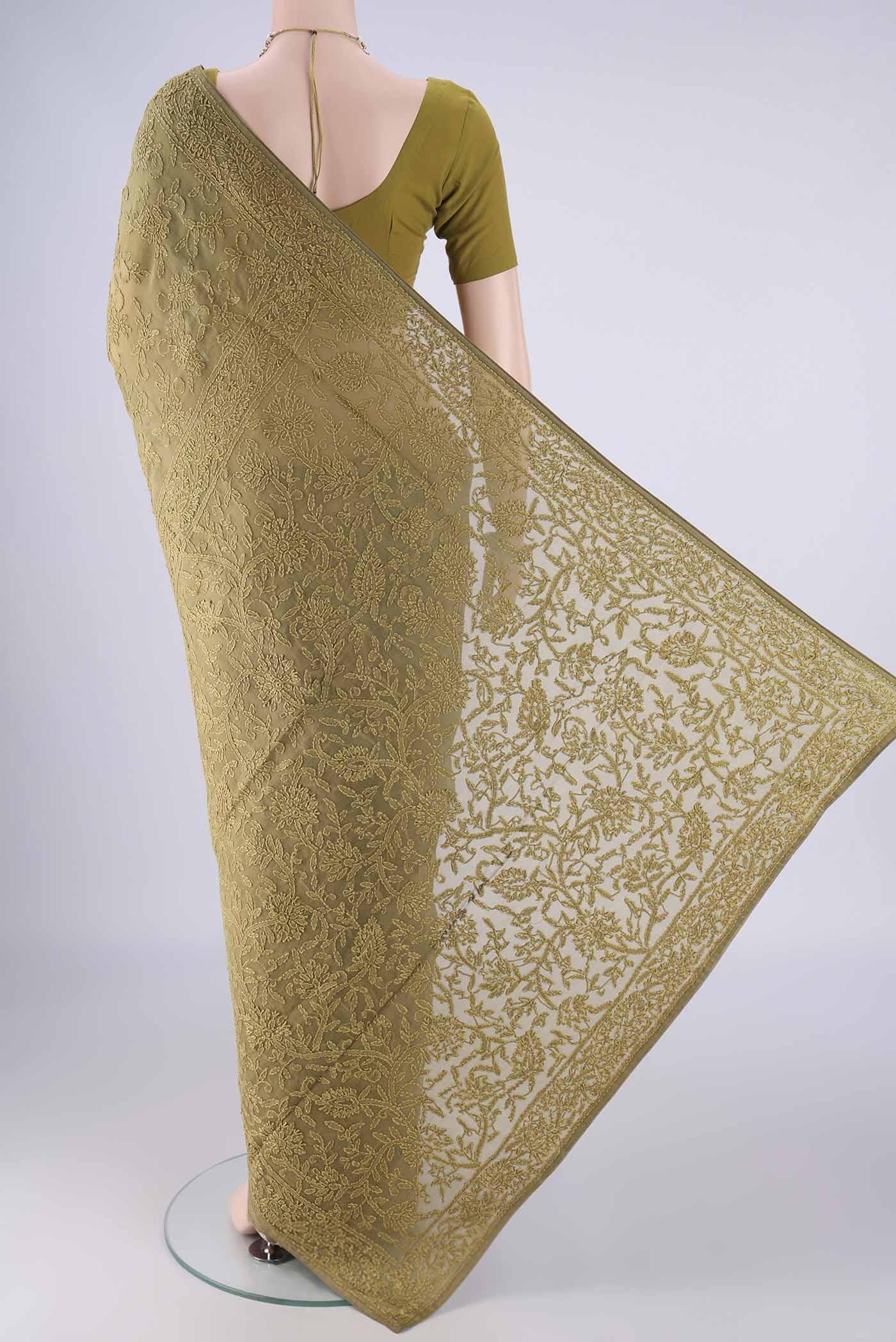 Flat view of Mehandi Green Organza Silk Saree with Embroidery on the body and Embroidery Border. 