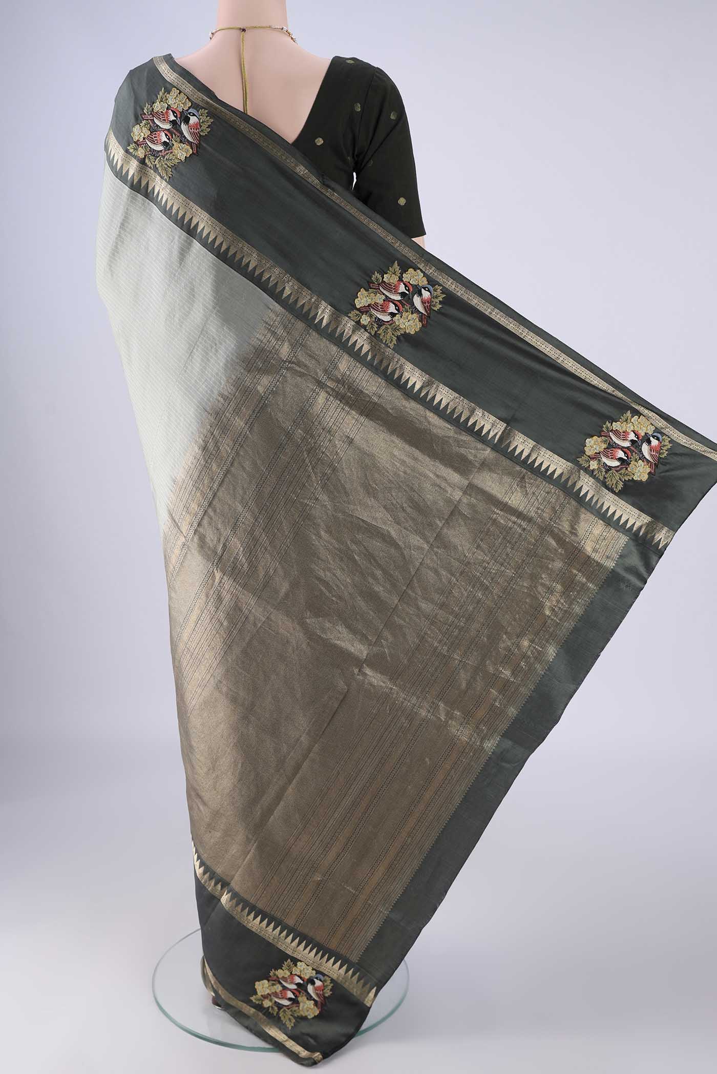 Flat view of Grey Kanchipuram Silk Saree with Stripes on the body and Zari Border. 