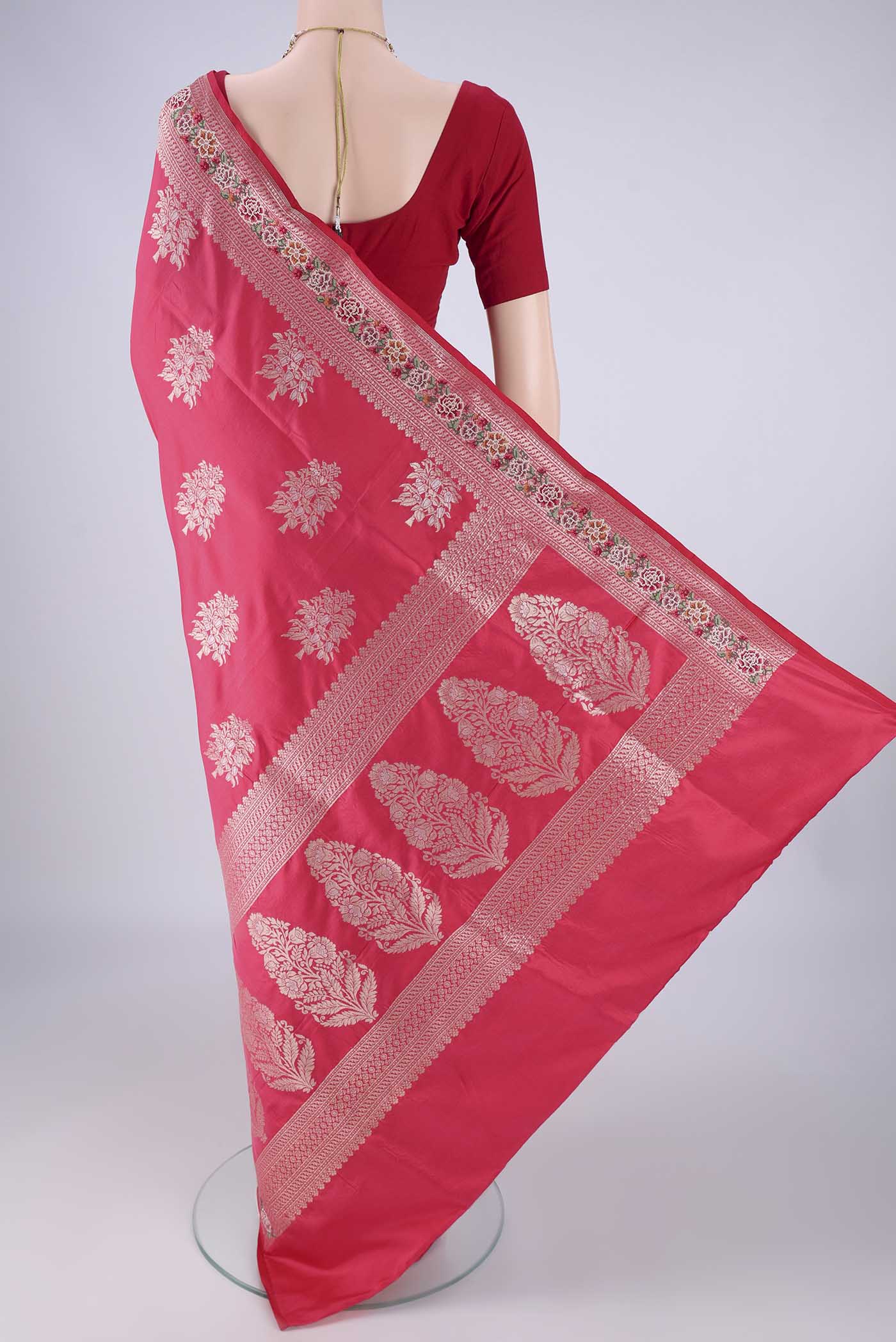Flat view of Imperial Pink Banarasi Silk Saree with Zari Butta on the body and Zari Border. 