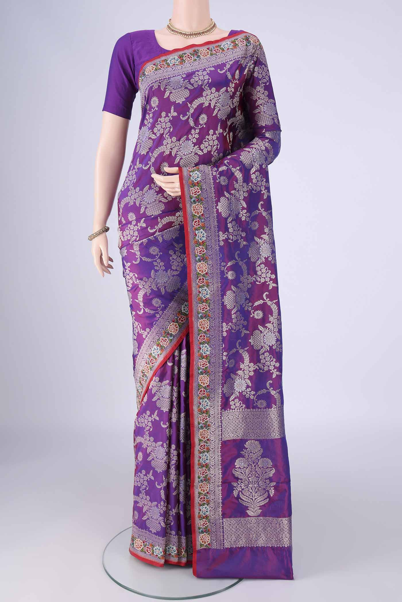 Purple Banarasi Silk Saree with Zari Brocade on the body and Zari Border.  displayed on a mannequin