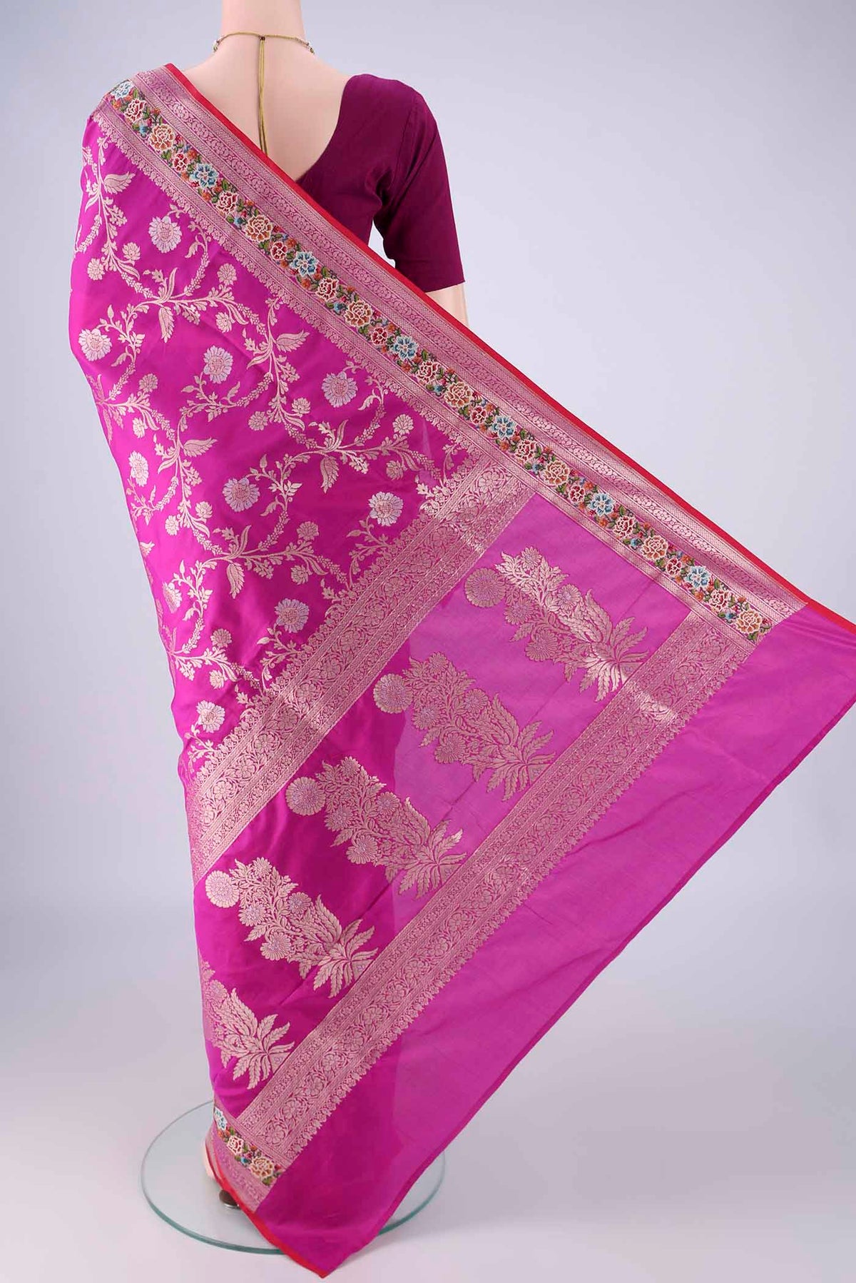 Flat view of Purple Banarasi Silk Saree with Zari Butta on the body and Zari Border. 