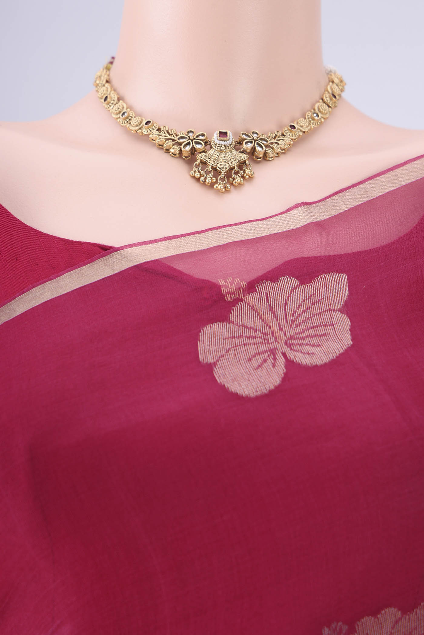 Border image of Burgundy Kanchipuram Silk Saree with Embroidery on the body and Embroidery Border. 
