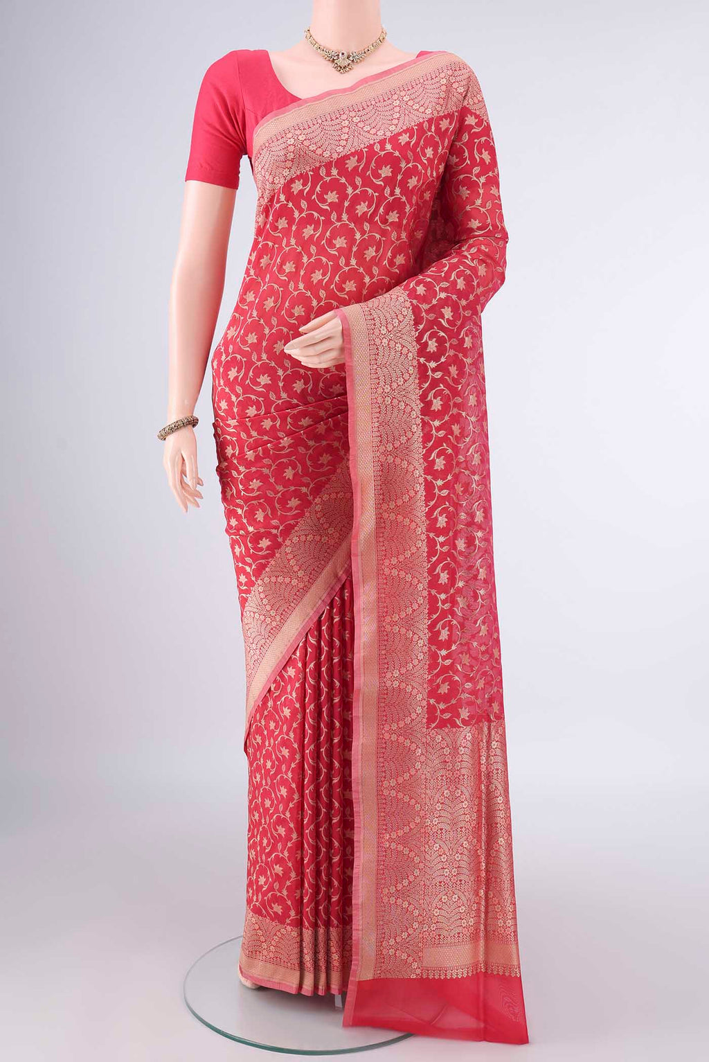 Pure Silk Red Banarasi Saree with Zari Brocade on the body and Zari Border.  displayed on a mannequin