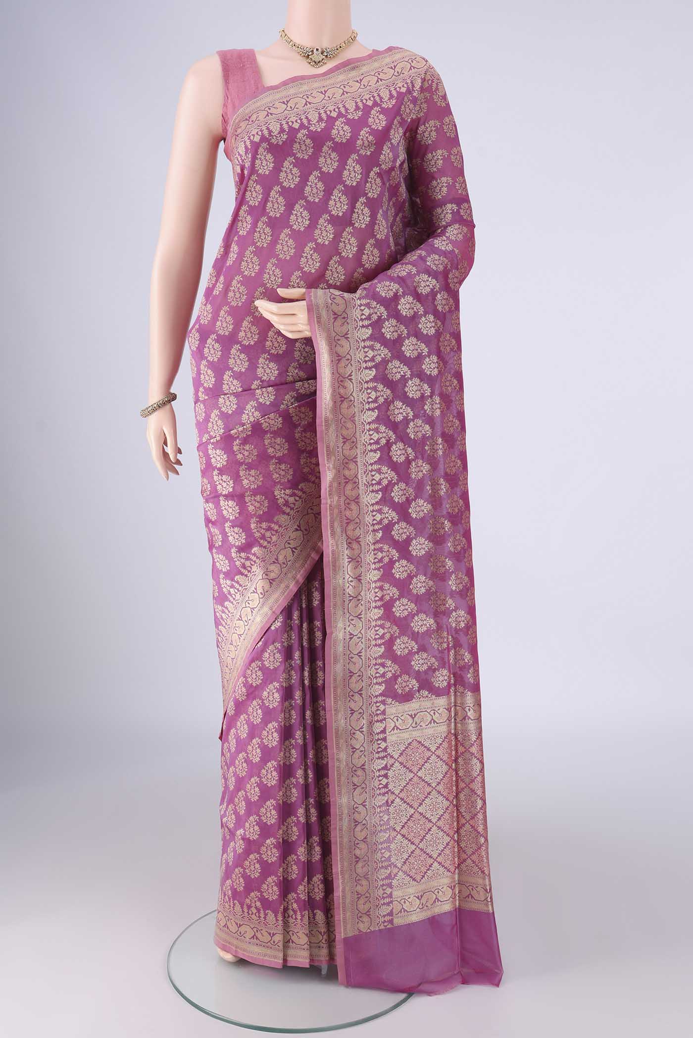 Lavender Banarasi Silk Saree with Zari Brocade on the body and Zari Border.  displayed on a mannequin