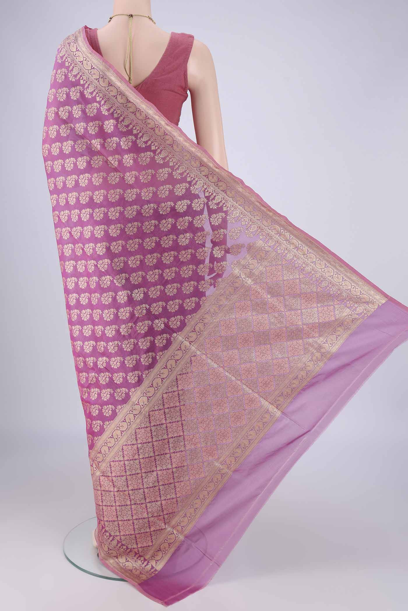 Flat view of Lavender Banarasi Silk Saree with Zari Brocade on the body and Zari Border. 