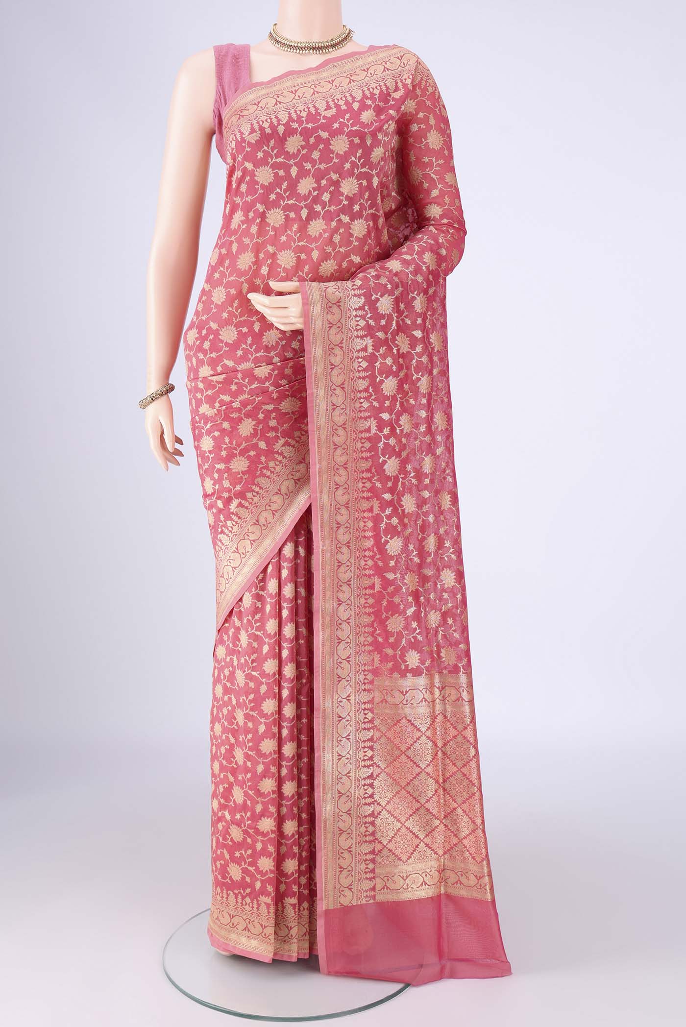Pink Banarasi Silk Saree with Zari Brocade on the body and Zari Border.  displayed on a mannequin