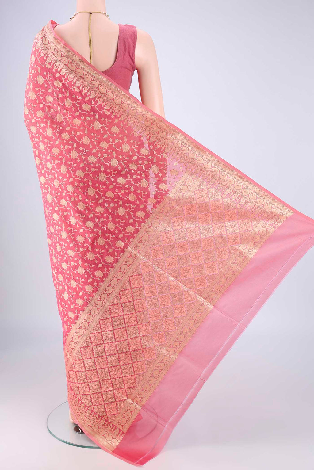 Flat view of Pink Banarasi Silk Saree with Zari Brocade on the body and Zari Border. 