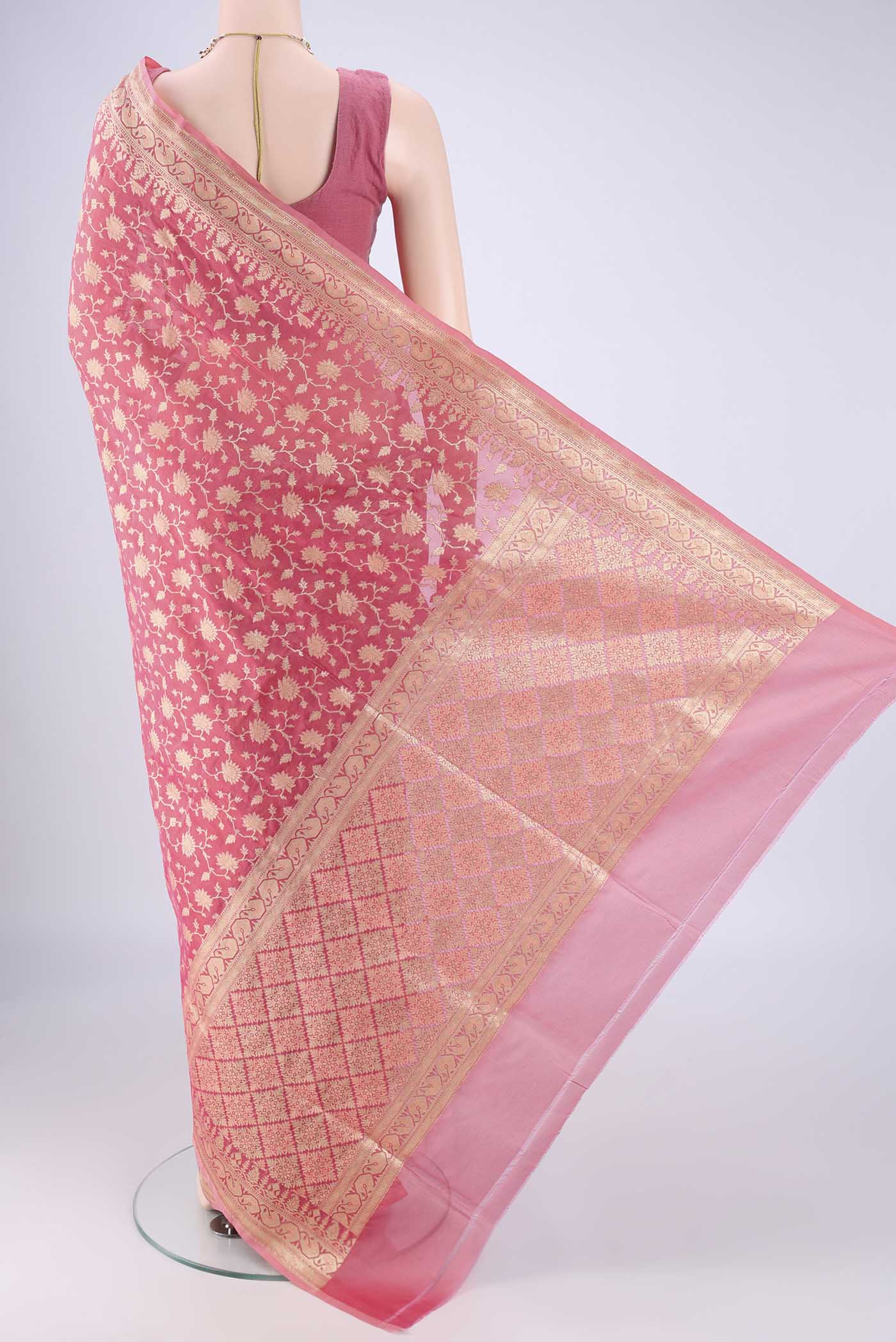 Flat view of Pink Banarasi Silk Saree with Zari Brocade on the body and Zari Border. 