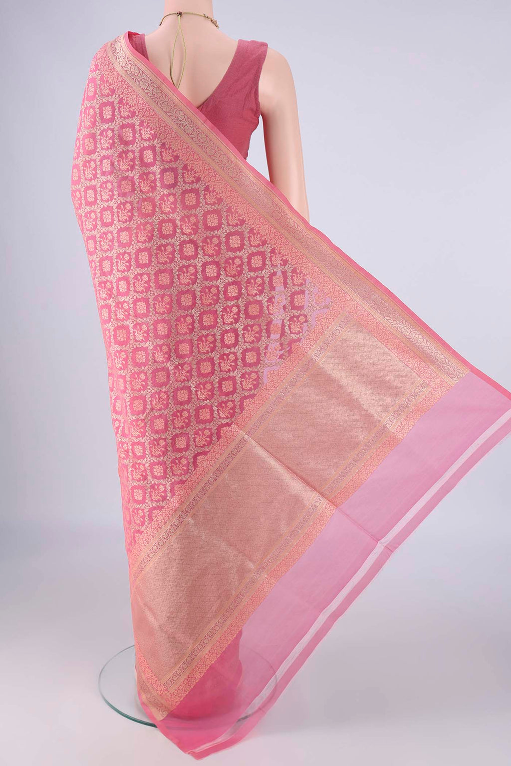 Flat view of Rose pink Banarasi Silk Saree with Zari Brocade on the body and Zari Border. 