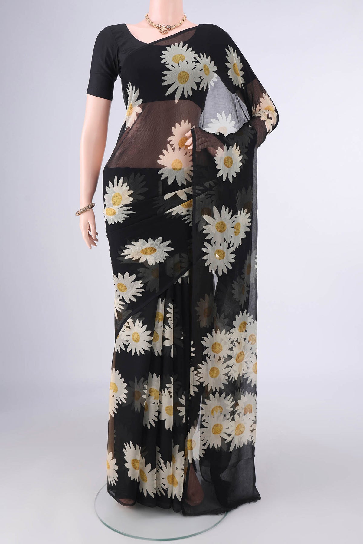 Black Mysore Chiffon Saree with Printed design on the body and Without Border.  displayed on a mannequin