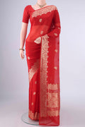 Red Banarasi Georgette Saree with Zari Butta on the body and Zari Border.  displayed on a mannequin