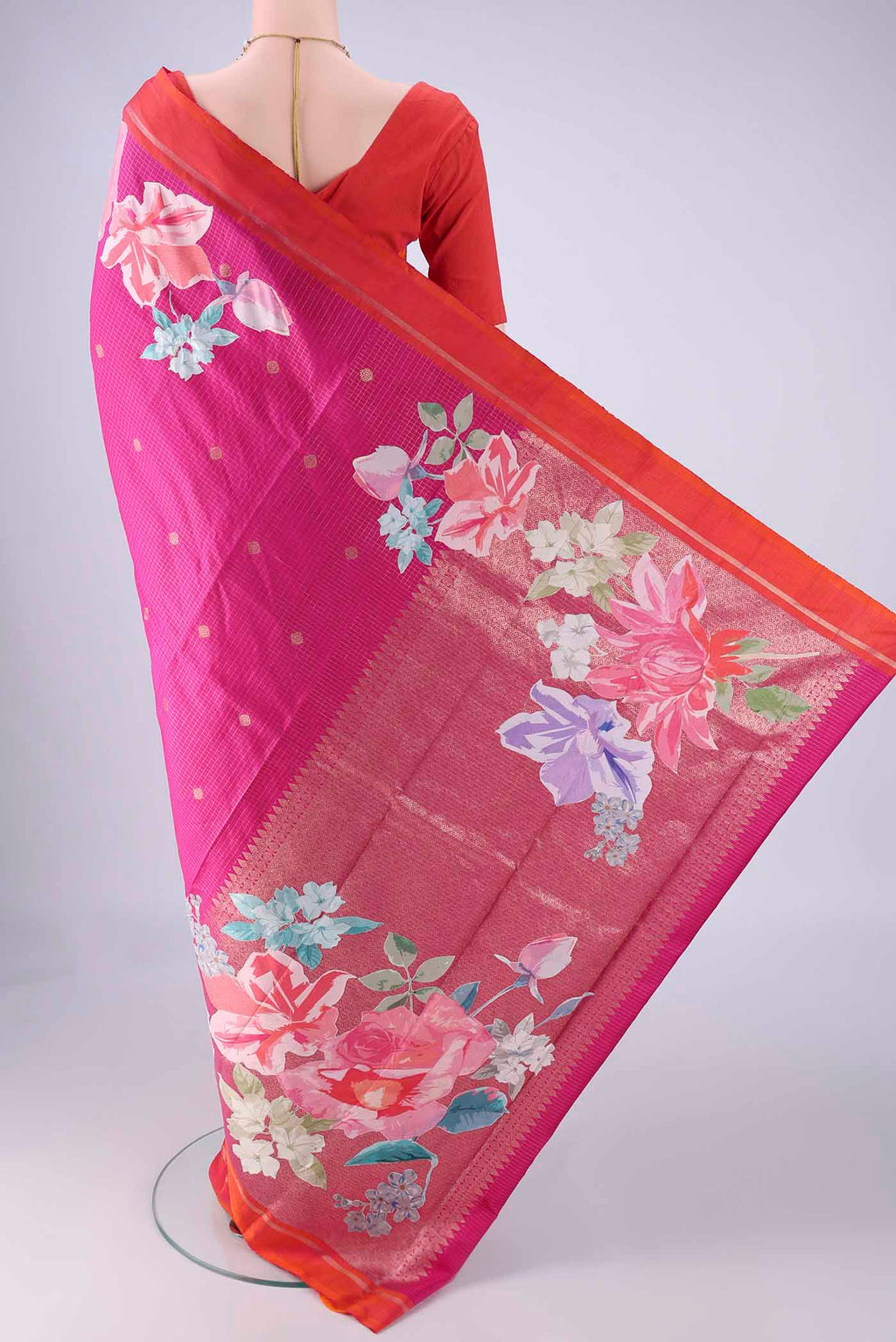 Flat view of Rani Pink Kanchipuram Silk Saree with Checked design on the body and Zari Border. 