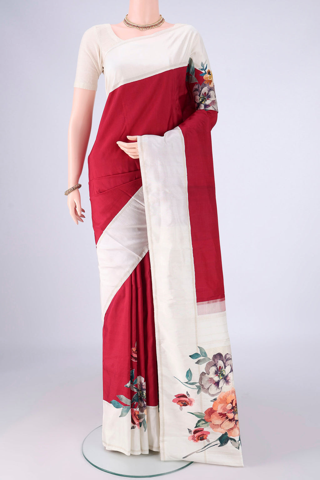Maroon Kanchipuram Silk Saree with Plain Body and Temple Border.  displayed on a mannequin