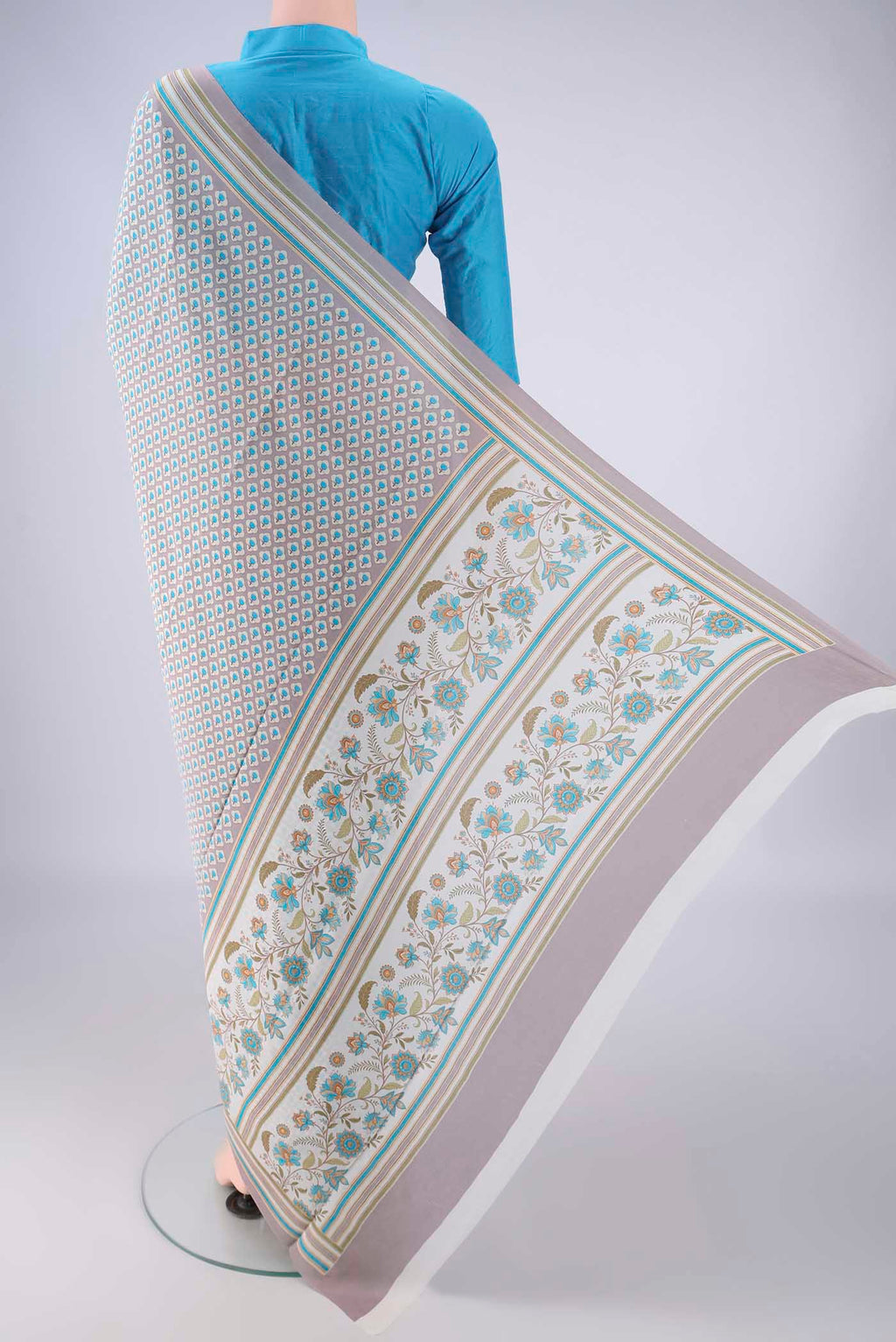 Flat view of Grey Mysore Crepe Saree with Printed design on the body and Plain Border. 