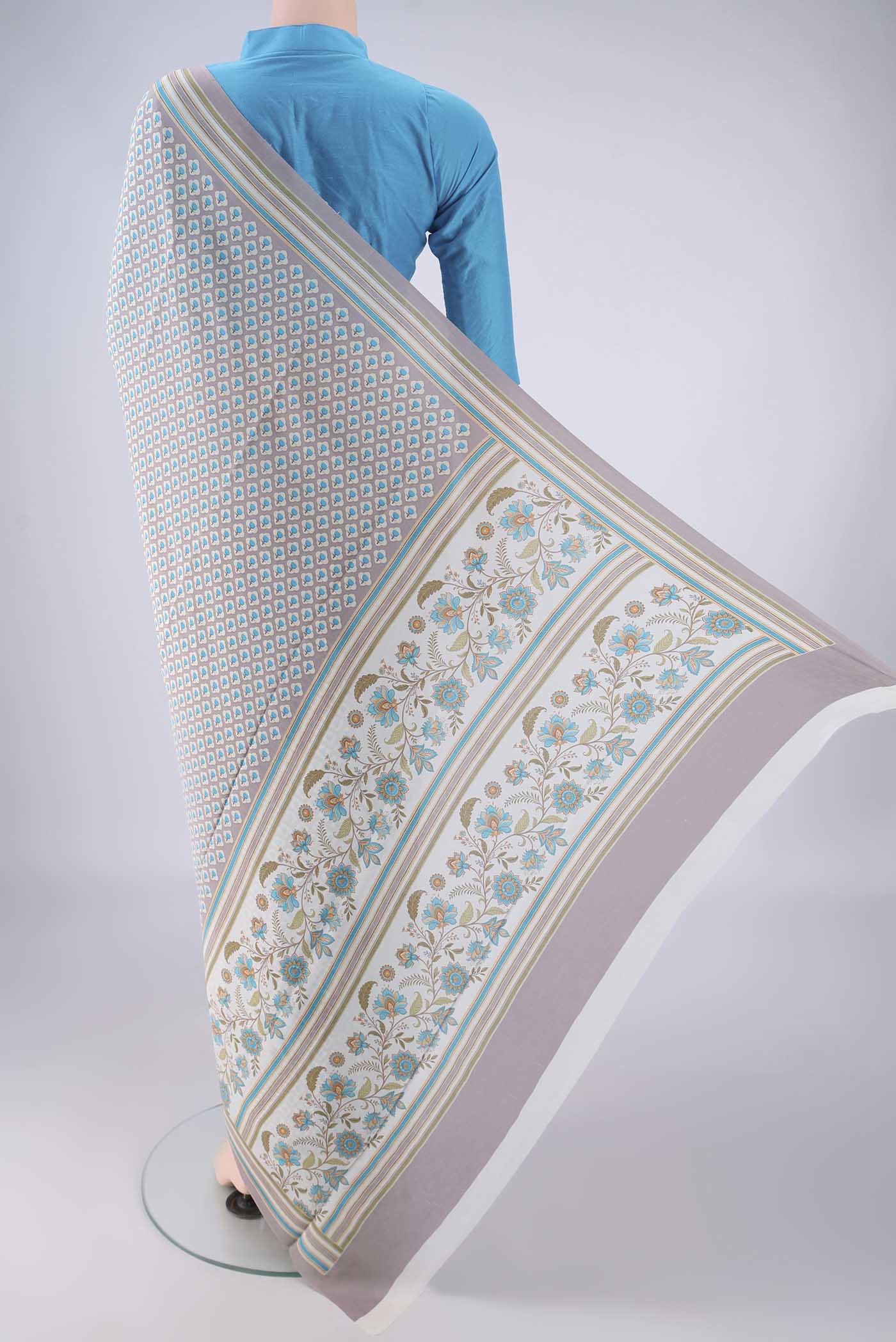 Flat view of Grey Mysore Crepe Saree with Printed design on the body and Plain Border. 