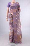 Lilac Organza Saree with Zari Butta on the body and Satin Border.  displayed on a mannequin
