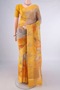 Multi Color Organza Saree with Zari Butta on the body and Satin Border.  displayed on a mannequin