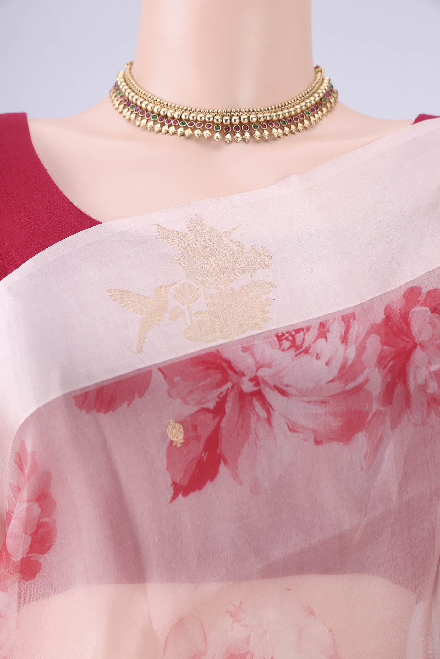 Border image of Pink Organza Silk Saree with Printed design on the body and Zari Border. 