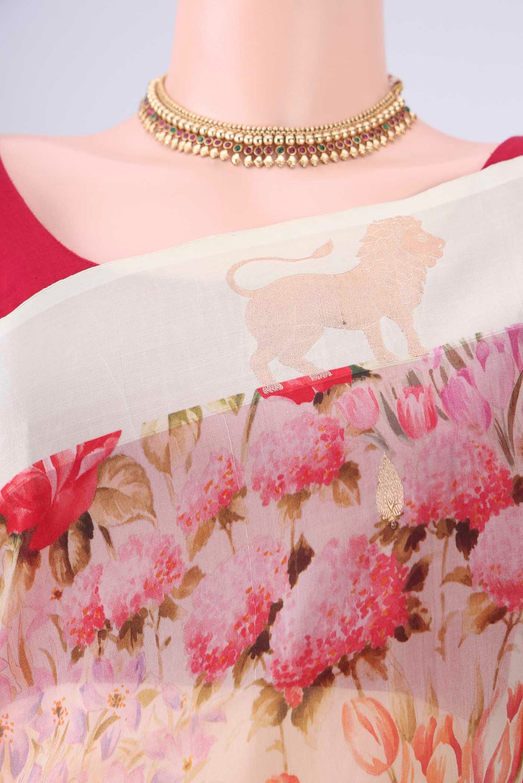 Border image of Off White Organza Silk Saree with Printed design on the body and Zari Border. 