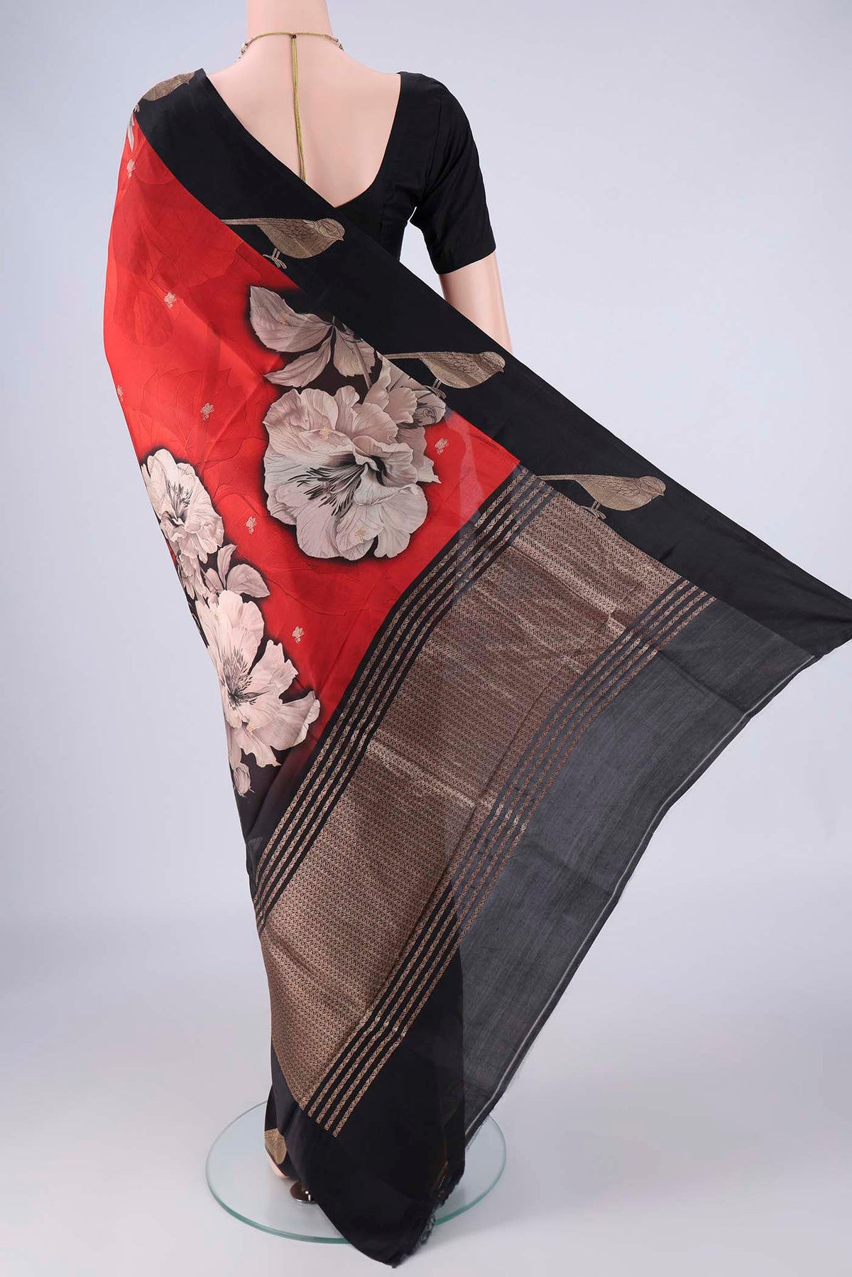 Flat view of Red Banarasi Katan Silk Saree with Floral Print on the body and Satin Border. 