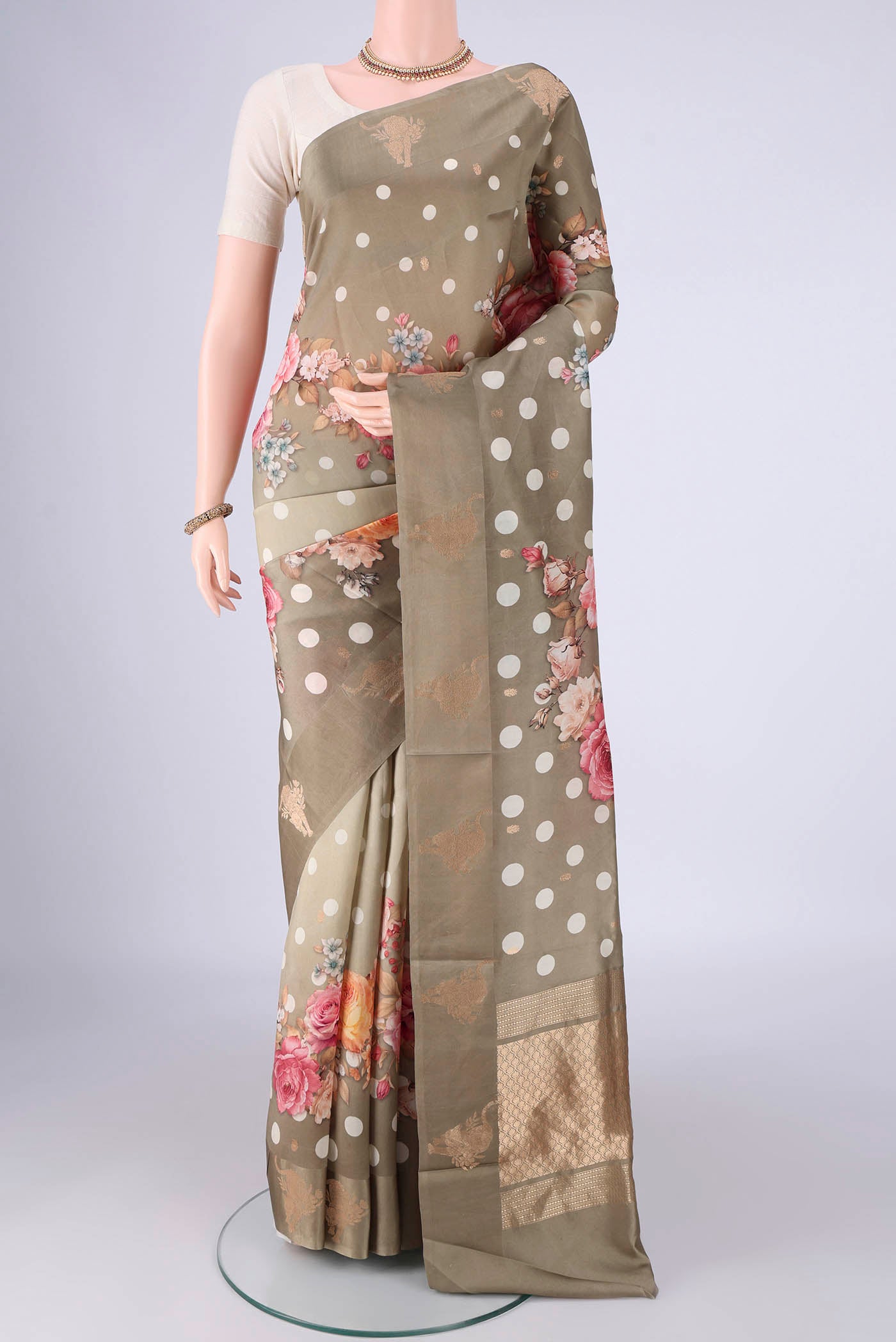 Beige Banarasi Katan Silk Saree with Polka Dots on the body and Satin Border.  displayed on a mannequin