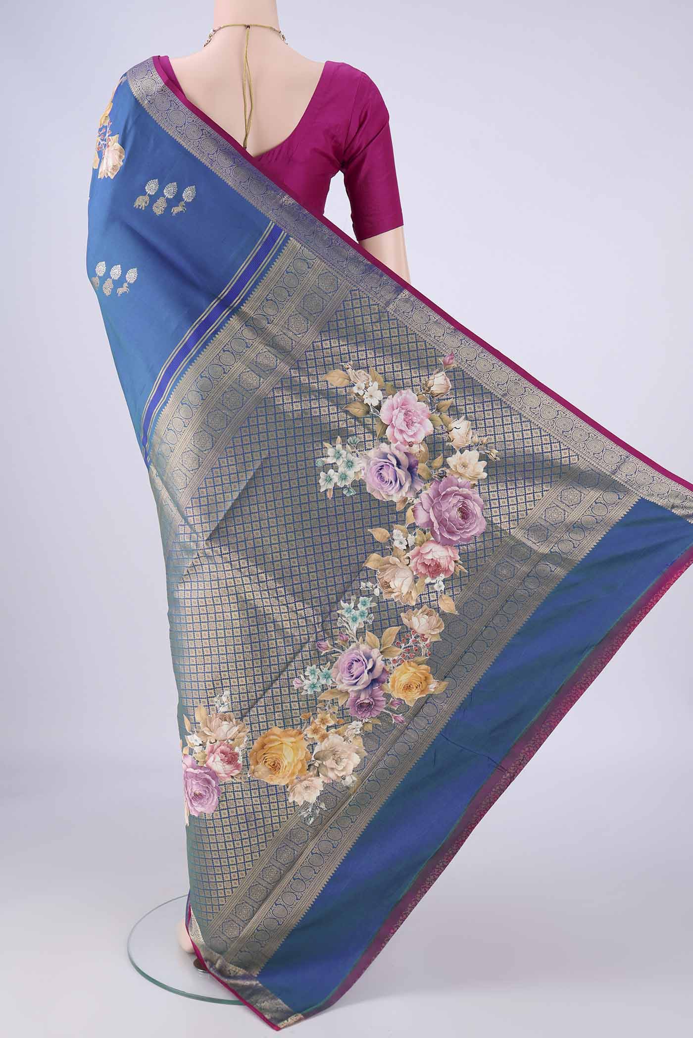 Flat view of Blue Kanjivaram Silk Saree with Zari Butta on the body and Zari Border. 
