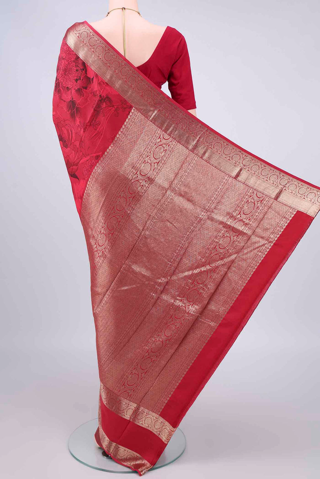 Flat view of Pure Silk Red Printed Saree with Floral Print on the body and Zari Border. 