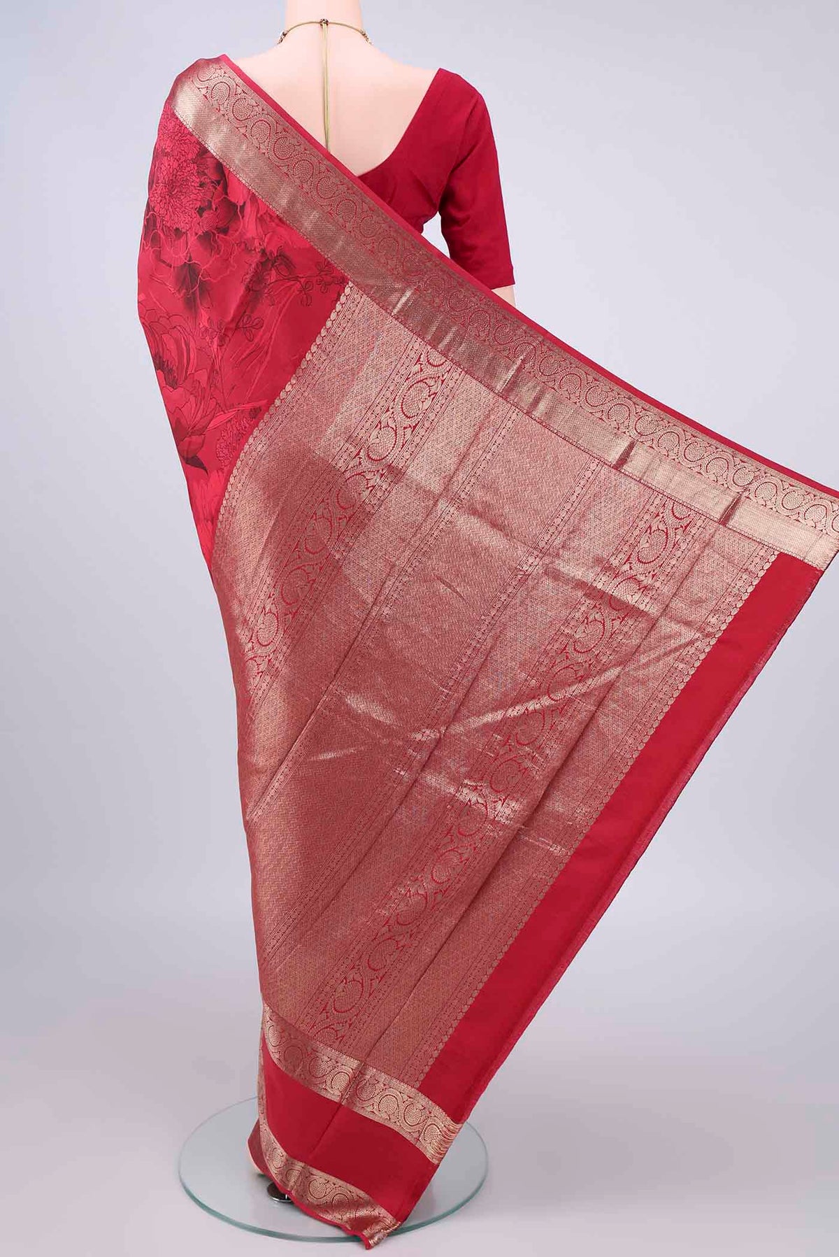 Flat view of Pure Silk Red Printed Saree with Floral Print on the body and Zari Border. 