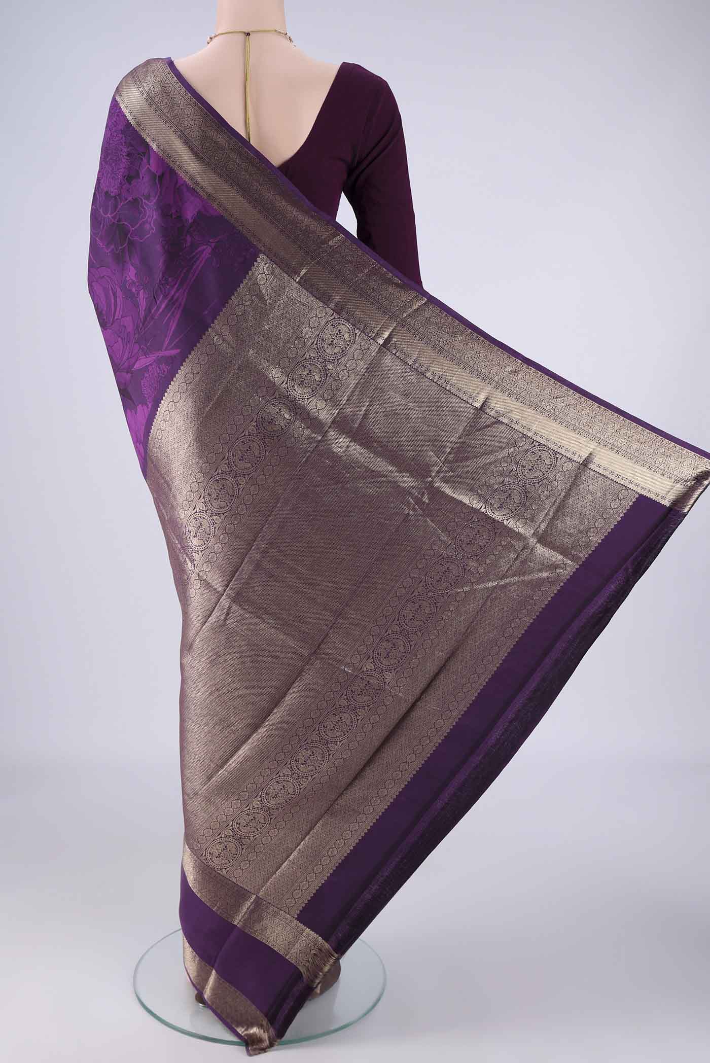Flat view of Purple Printed Silk Saree with Floral Print on the body and Zari Border. 