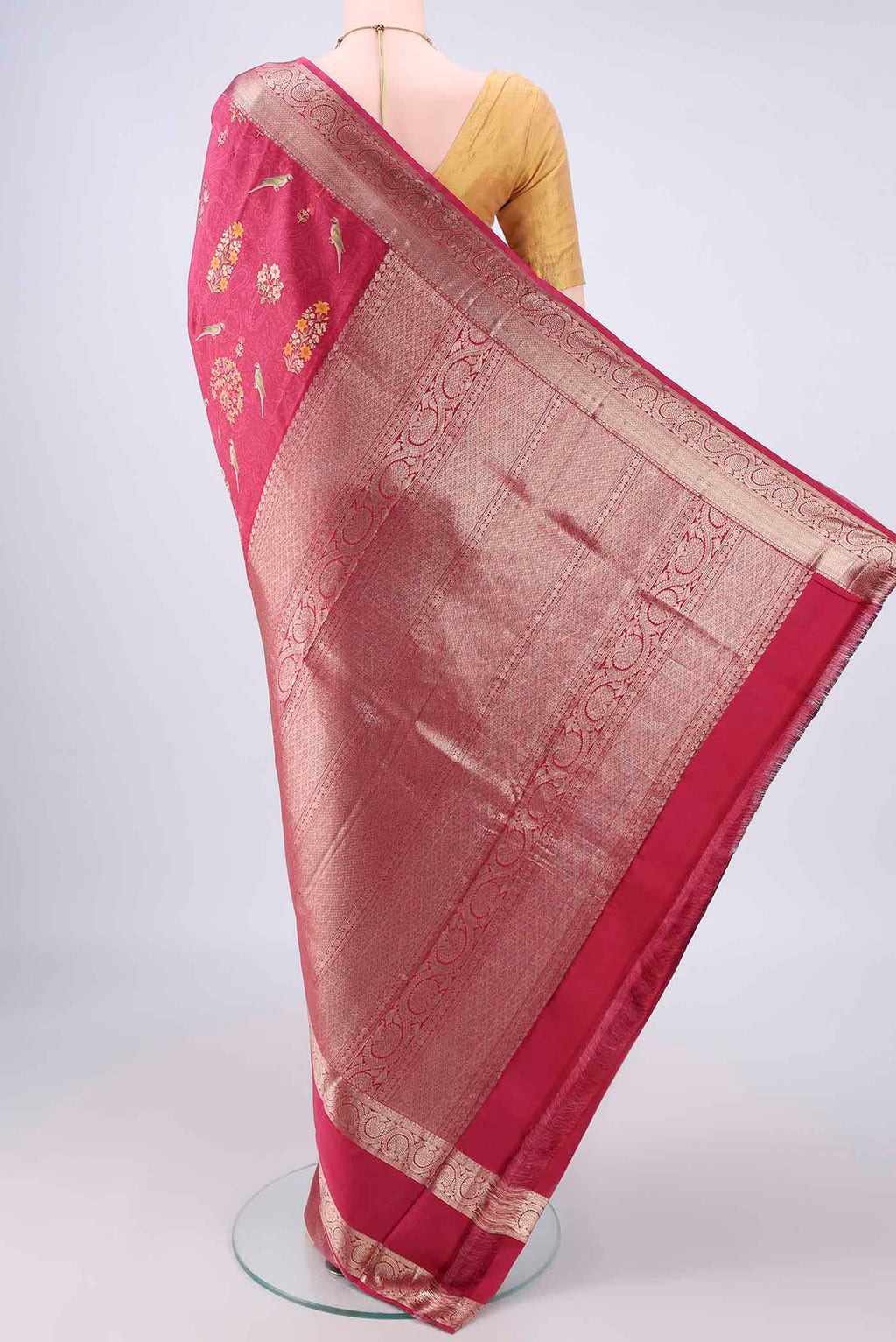 Flat view of Pure Silk Coral Printed Saree with Printed design on the body and Zari Border. 