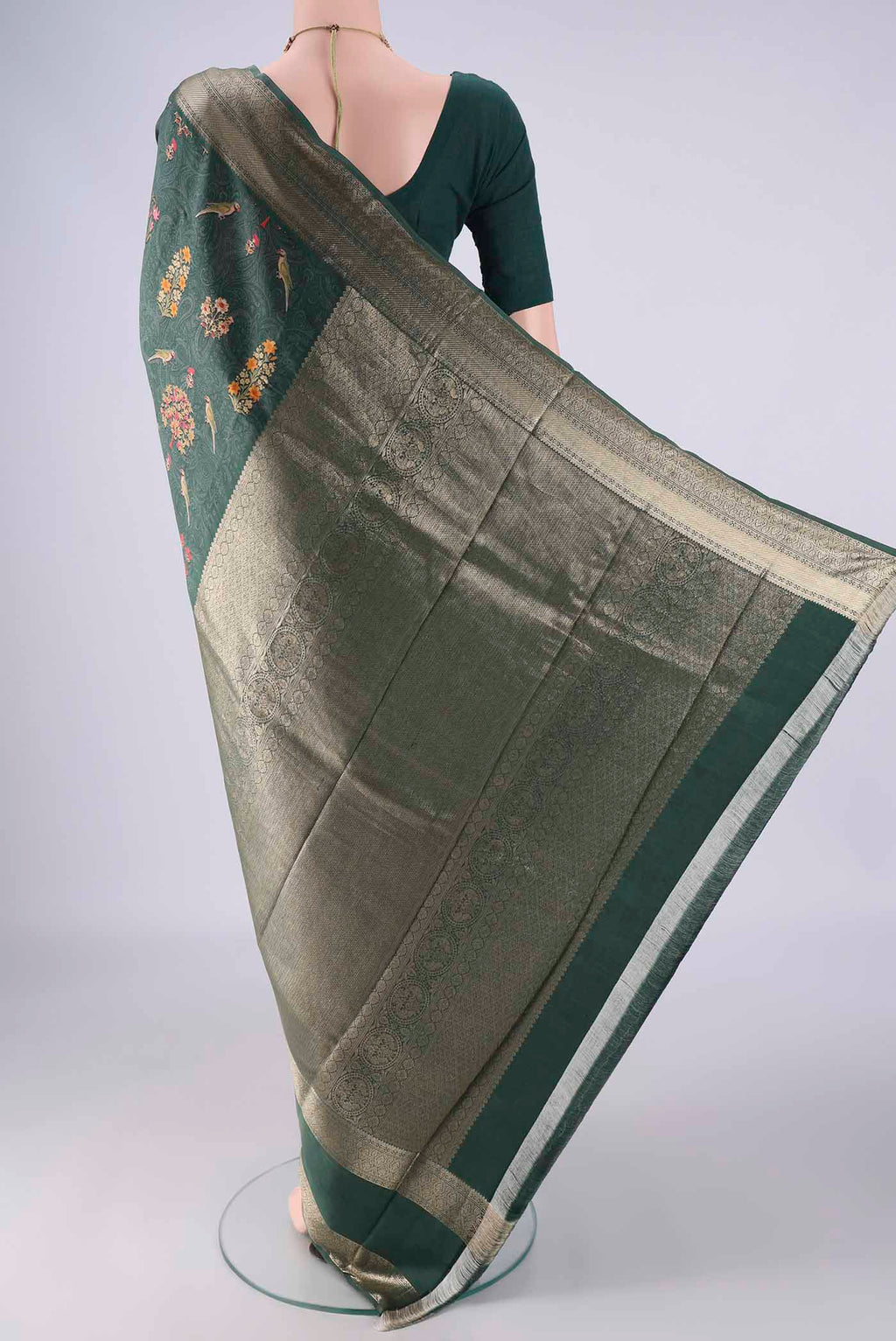 Flat view of Olive Green Kanchipuram Silk Saree with Floral Print on the body and Zari Border. 