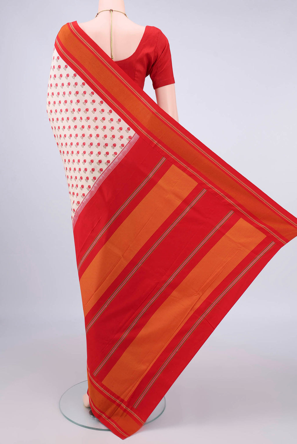 Flat view of Pure Silk Off White Printed Saree with Printed design on the body and Thread Border. 