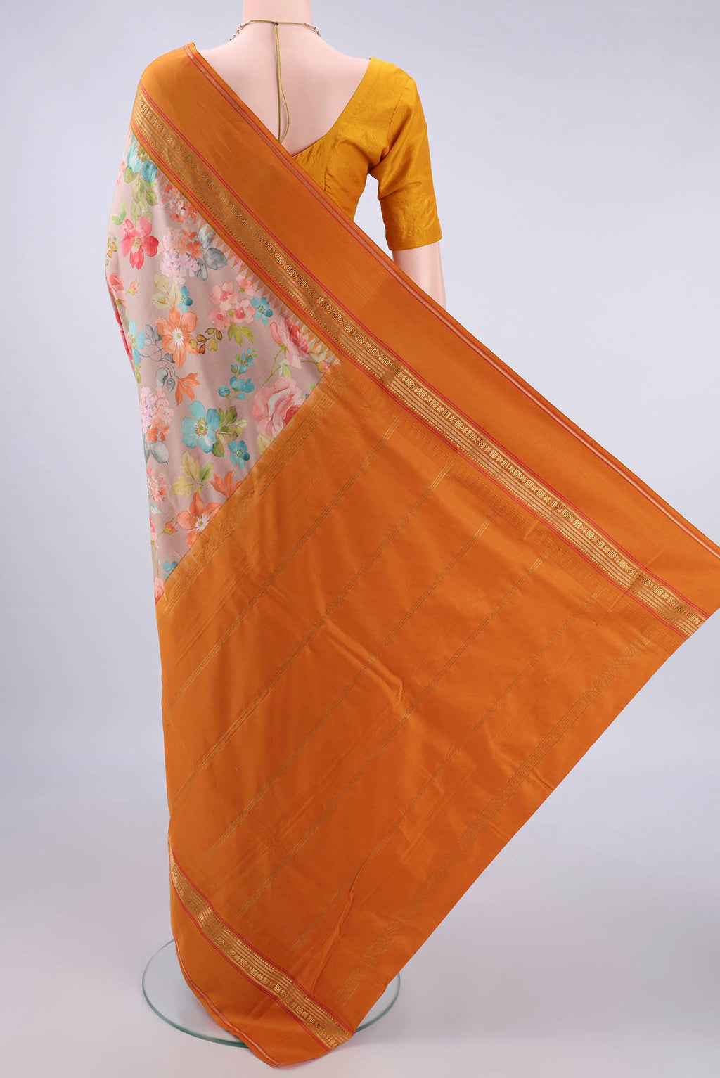 Flat view of Pure Silk Beige Printed Saree with Floral Print on the body and Zari Border. 