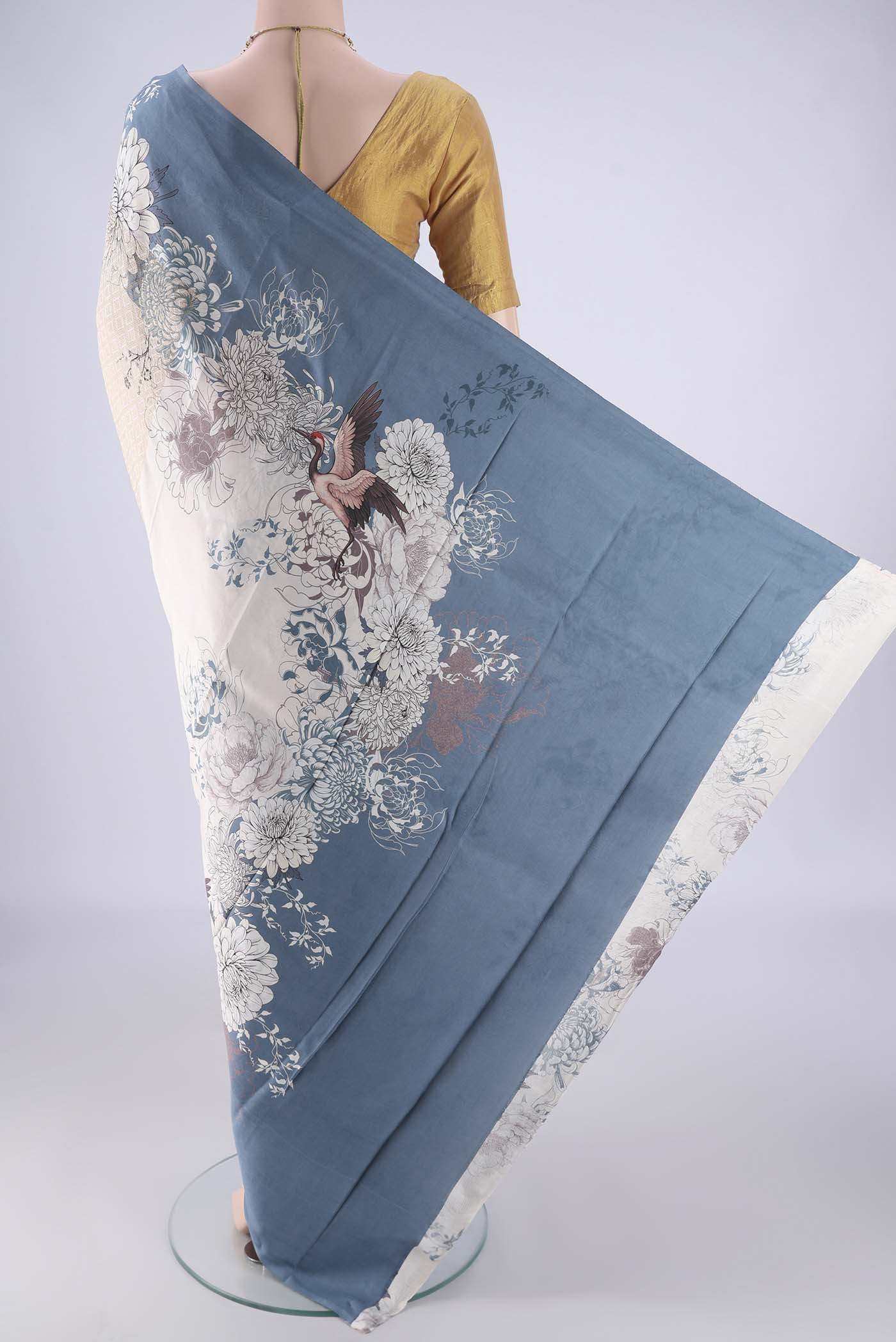 Flat view of Off White Banarasi Silk Saree with Zari Brocade on the body and Plain Border. 
