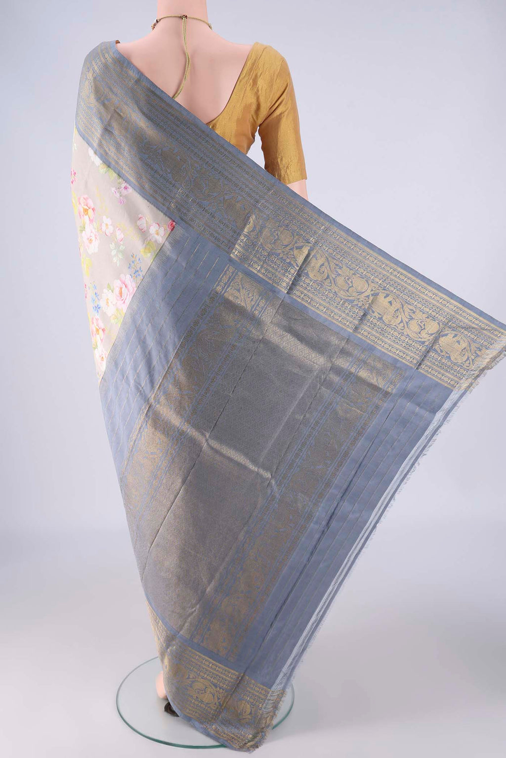Flat view of Dark Beige Kanchipuram Silk Saree with Floral Print on the body and Zari Border. 