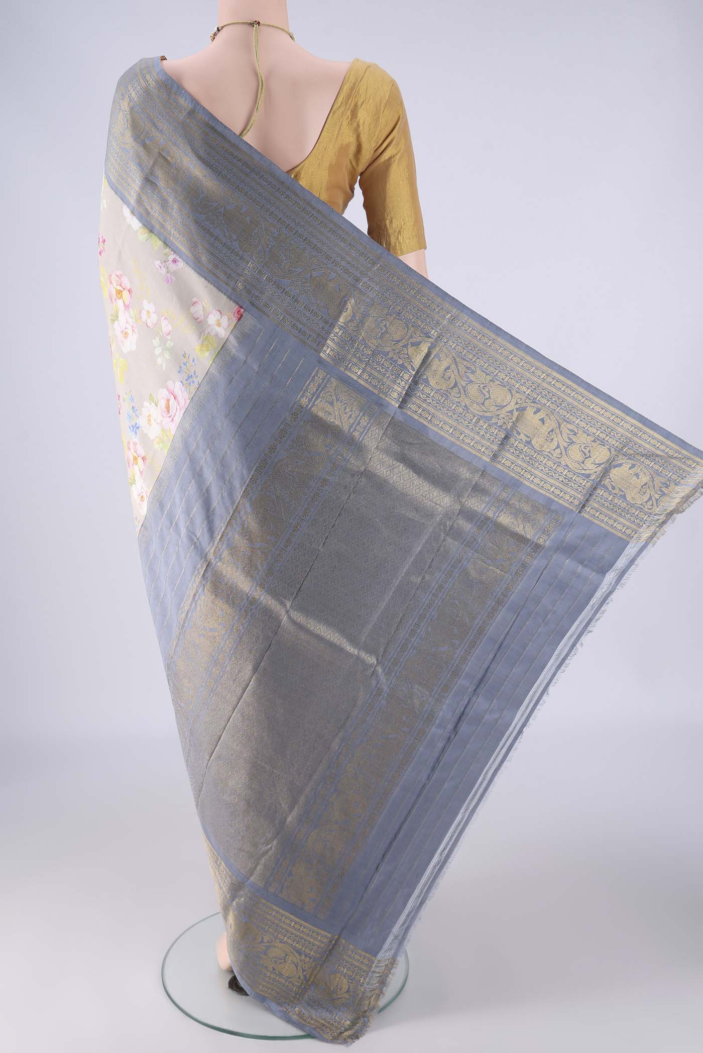 Flat view of Dark Beige Kanchipuram Silk Saree with Floral Print on the body and Zari Border. 